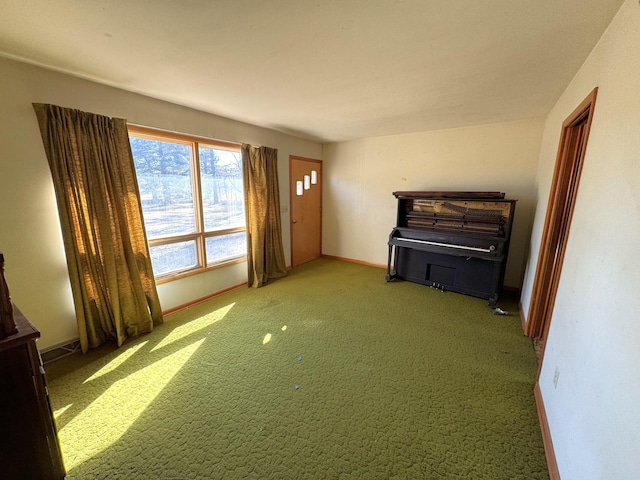 misc room featuring dark colored carpet