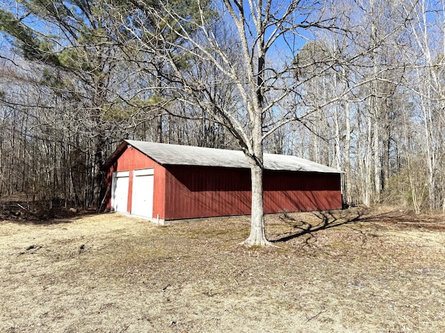 view of outdoor structure with a garage