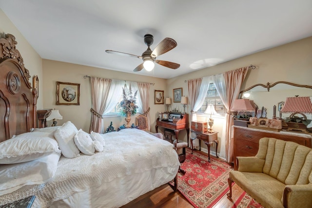 bedroom featuring ceiling fan and hardwood / wood-style floors