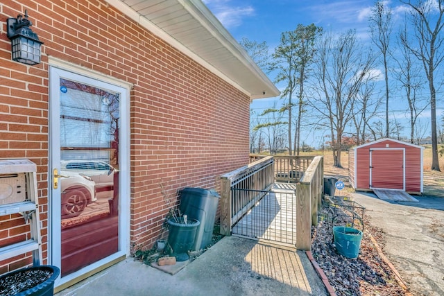 view of side of home featuring a storage unit