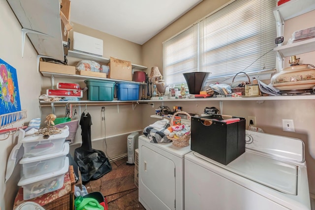 washroom with washer and clothes dryer