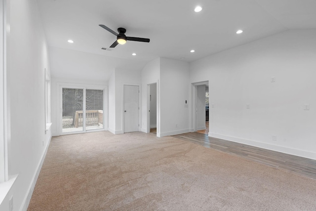 interior space with ceiling fan and lofted ceiling