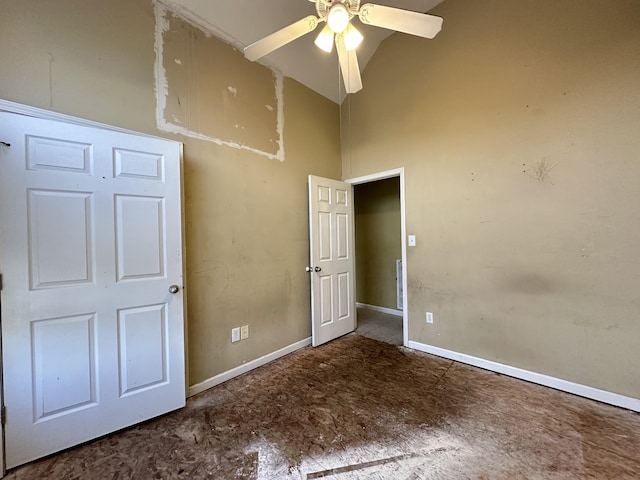 unfurnished bedroom featuring ceiling fan and high vaulted ceiling