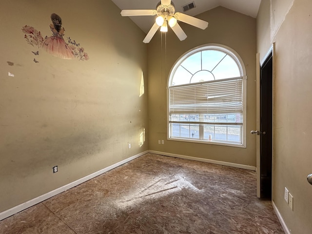 spare room featuring ceiling fan and lofted ceiling