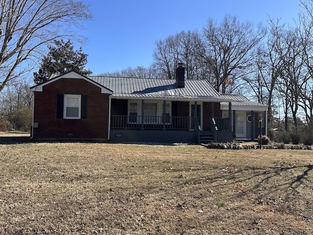 view of front of home with covered porch and a front yard