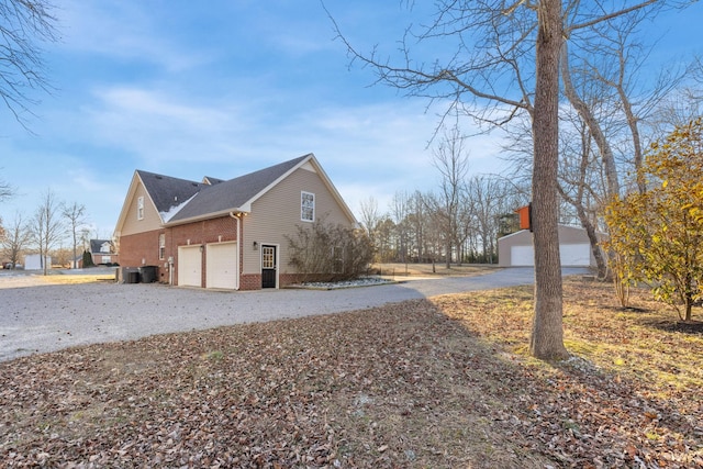 view of side of property featuring a garage