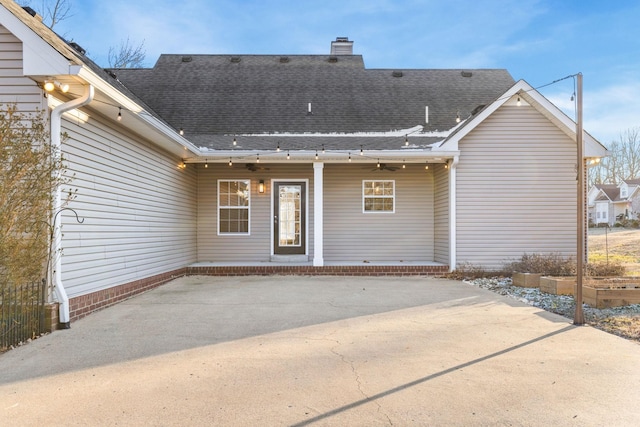 back of house featuring a patio area and ceiling fan