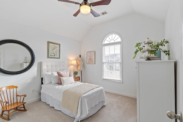 bedroom featuring ceiling fan, light carpet, and lofted ceiling