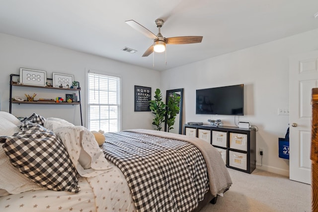 carpeted bedroom with ceiling fan