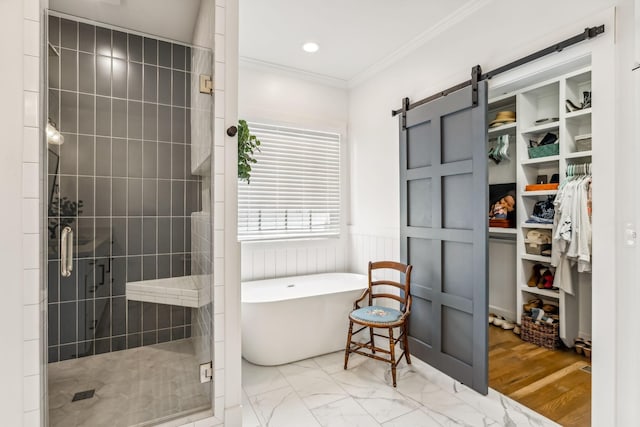 bathroom featuring crown molding and independent shower and bath