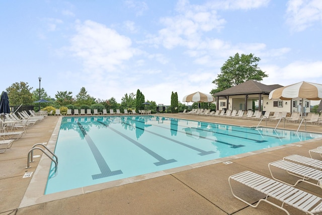 view of swimming pool featuring a patio