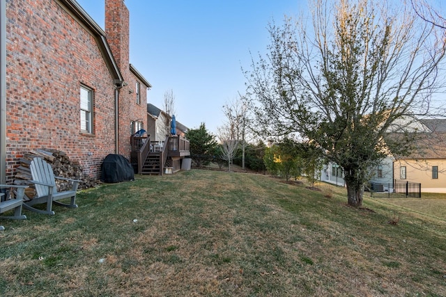 view of yard featuring a deck