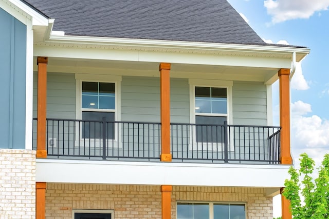 view of side of home with a porch