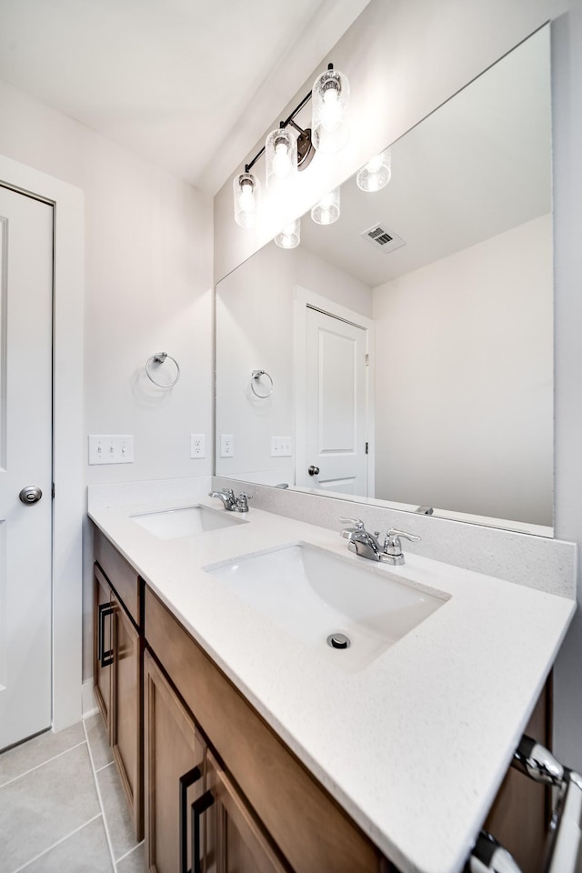 bathroom featuring vanity and tile patterned flooring