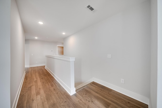 hall with light wood-type flooring