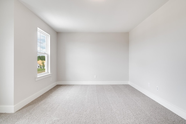 unfurnished room featuring carpet floors