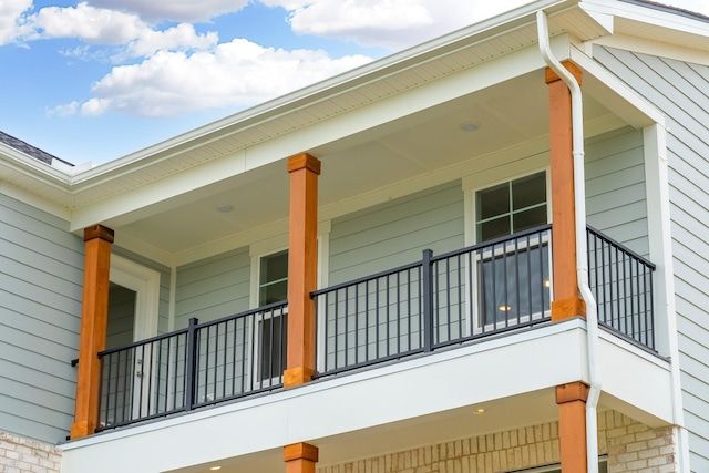 view of side of property with a porch