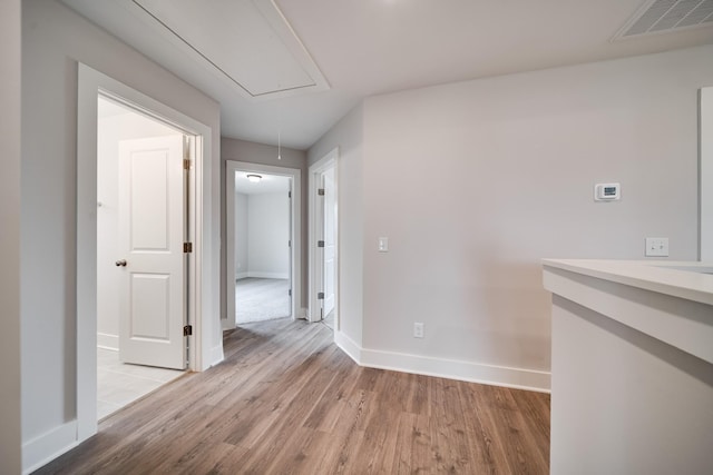 hallway featuring light hardwood / wood-style floors