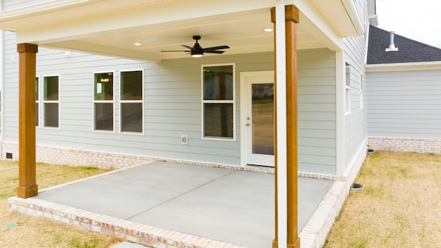 exterior space with ceiling fan