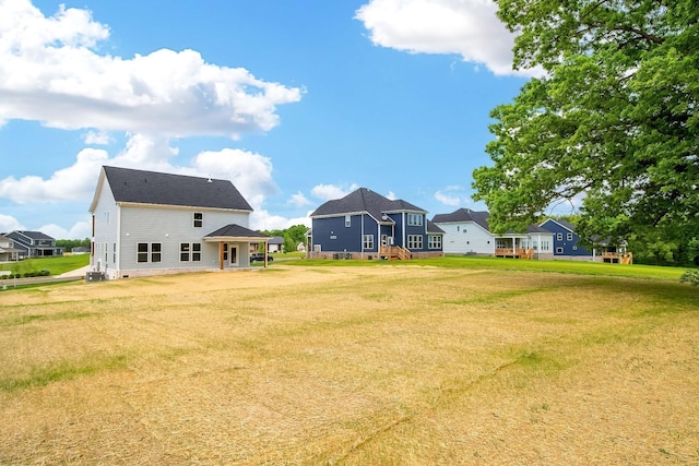 view of yard featuring central AC