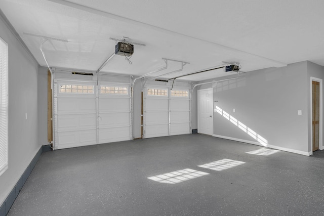 garage featuring a garage door opener