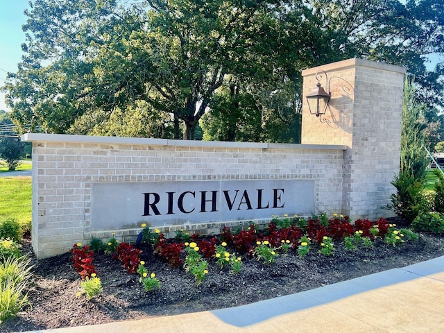 view of community sign