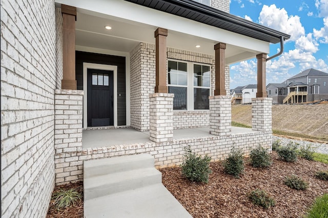 doorway to property with a porch