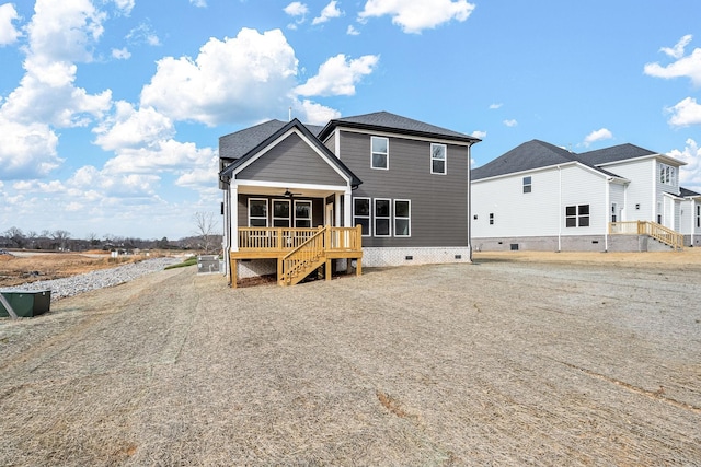 back of property featuring ceiling fan