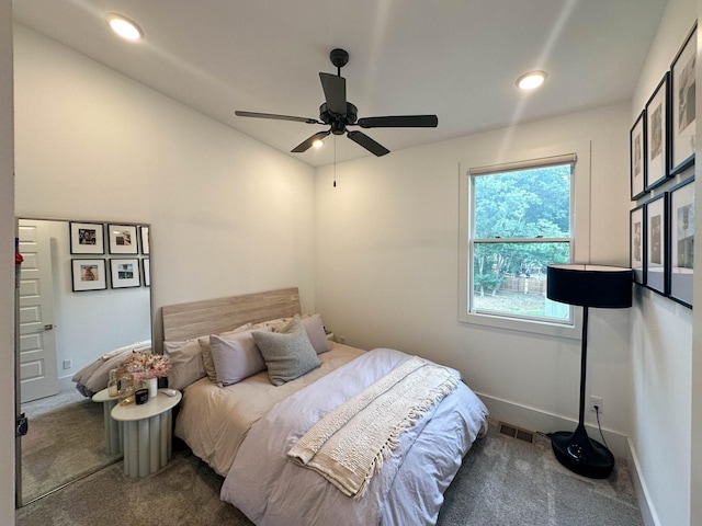 carpeted bedroom featuring ceiling fan