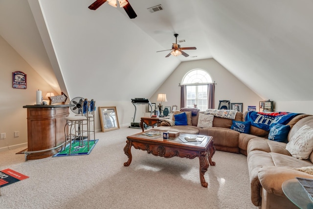 carpeted living room featuring ceiling fan and lofted ceiling