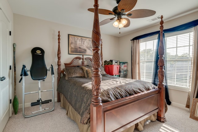 bedroom featuring ceiling fan and light colored carpet