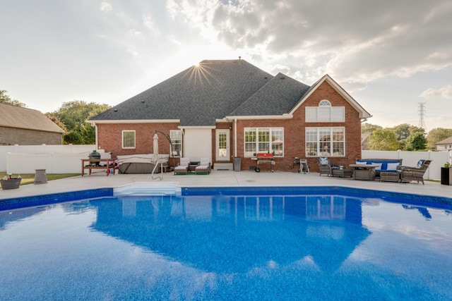 view of swimming pool with a patio area and outdoor lounge area