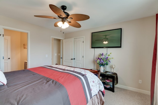 carpeted bedroom with a closet and ceiling fan