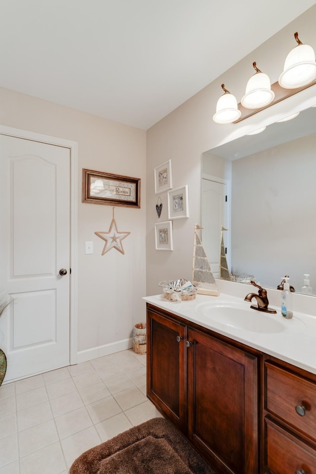 bathroom with vanity and tile patterned floors