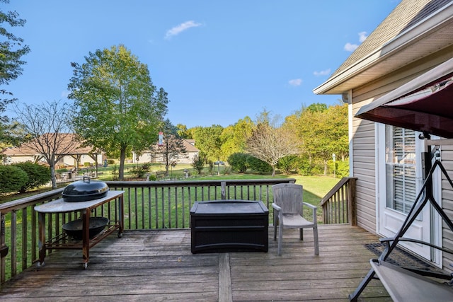 deck featuring a lawn