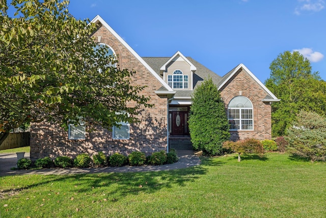 view of front facade featuring a front yard