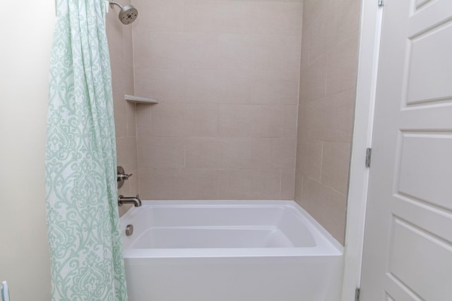 bathroom featuring shower / bath combo with shower curtain