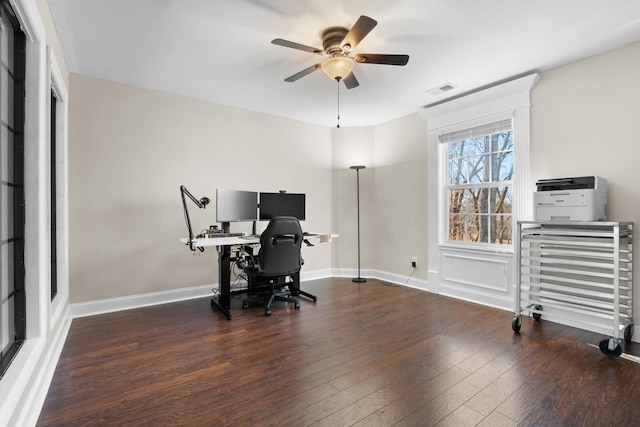 office area with ceiling fan and dark hardwood / wood-style flooring