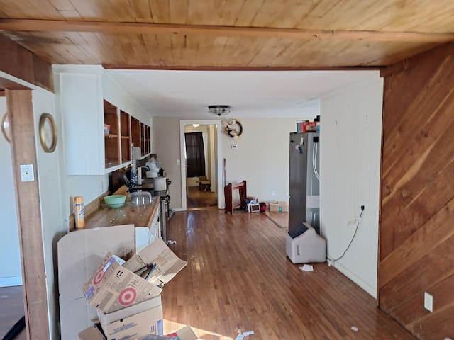 misc room with dark hardwood / wood-style floors and wood ceiling