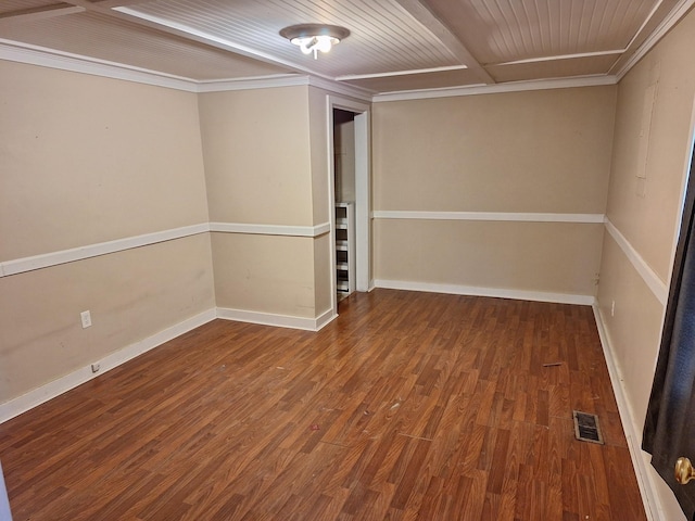 unfurnished room featuring crown molding and hardwood / wood-style flooring