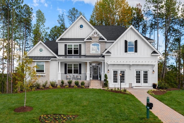 craftsman-style home featuring a front yard and a porch