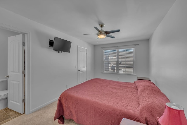 bedroom featuring light carpet and ceiling fan