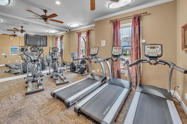 workout area featuring ornamental molding