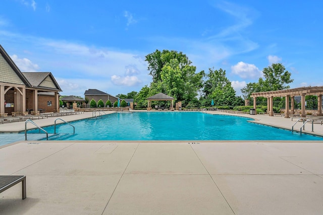 view of pool with a patio area, a gazebo, and a pergola