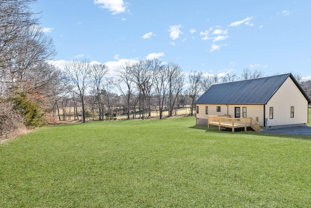 view of yard with a wooden deck