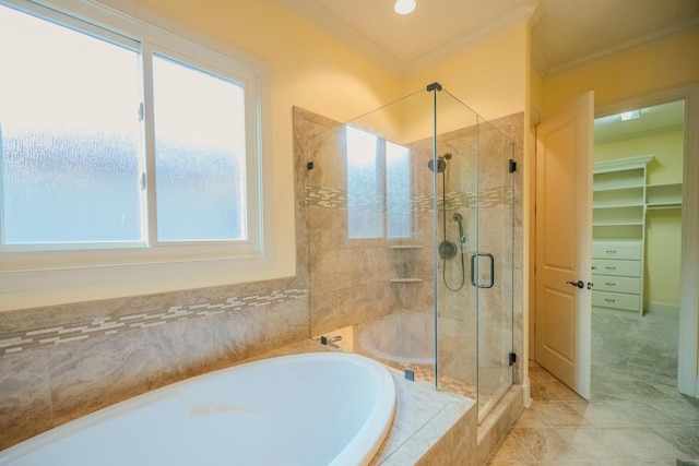 bathroom with ornamental molding and plus walk in shower