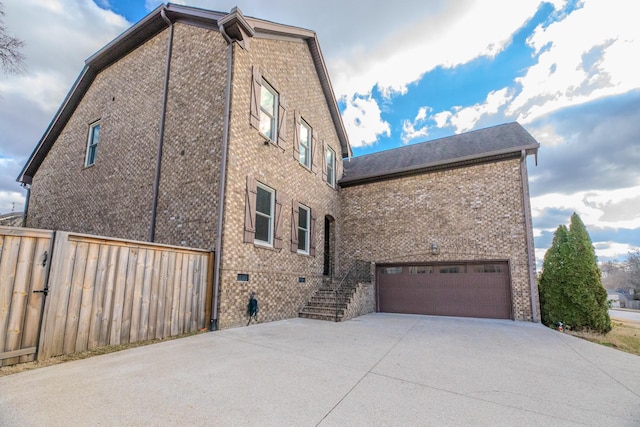 view of home's exterior with a garage