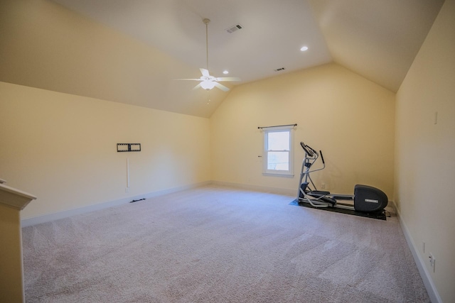 workout area featuring vaulted ceiling, ceiling fan, and carpet flooring