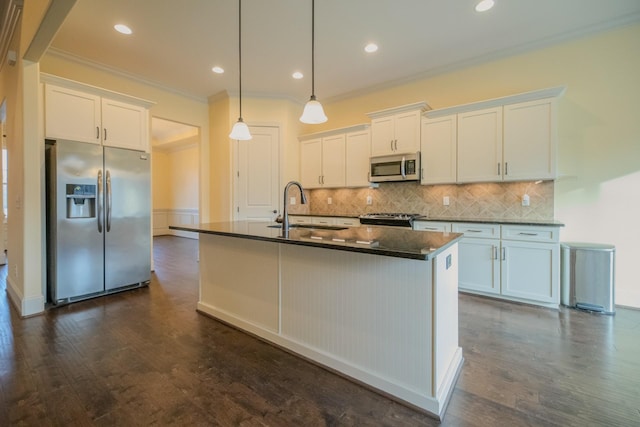 kitchen featuring white cabinetry, appliances with stainless steel finishes, and sink