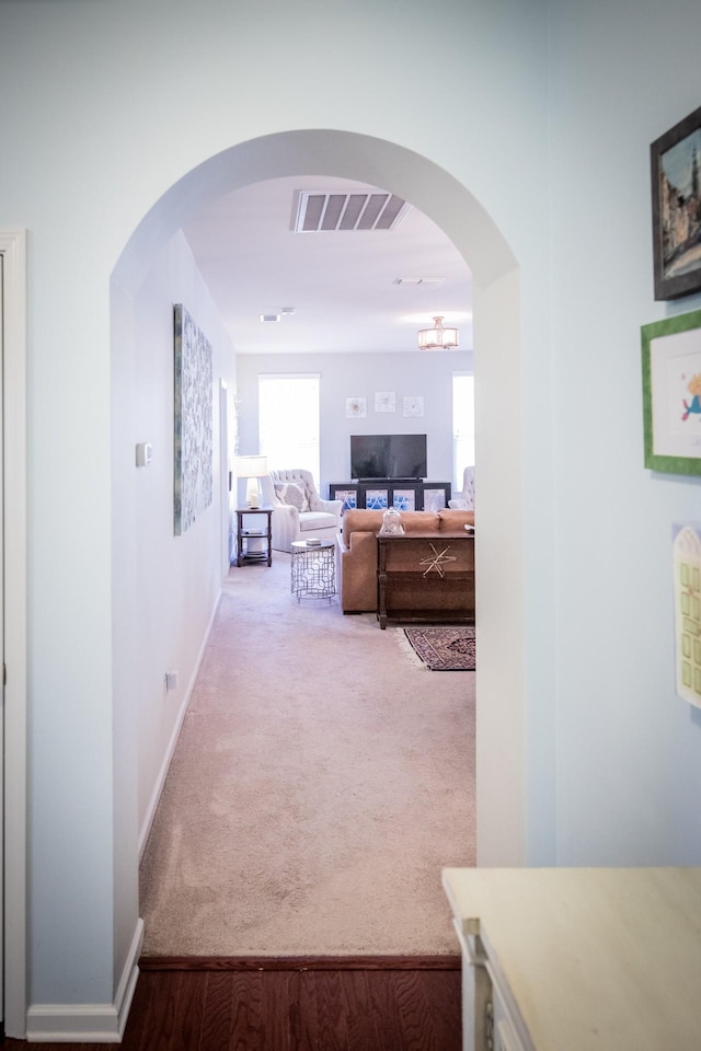 corridor featuring carpet